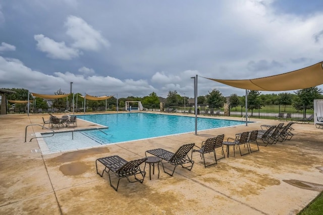 view of pool featuring a patio