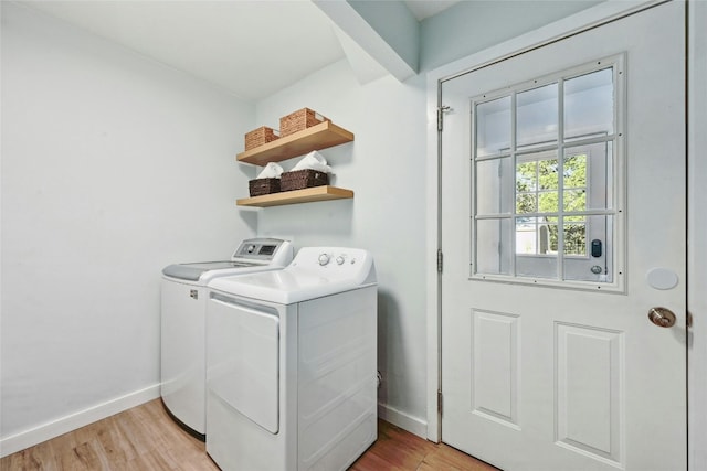 13016 S Madrone Trl, Austin, TX 78737 - laundry room featuring washing machine and dryer and light wood-style floors
