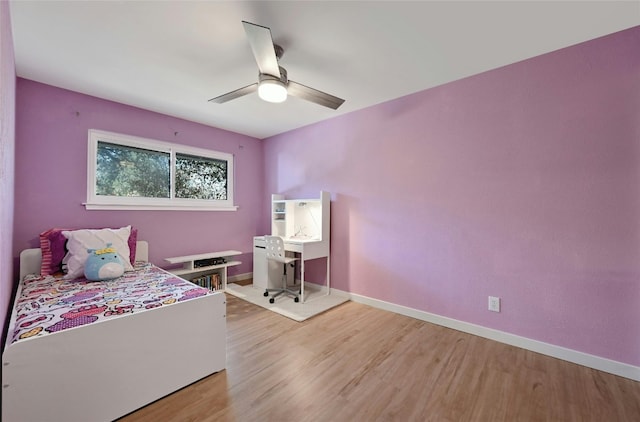13016 S Madrone Trl, Austin, TX 78737 - bedroom featuring light wood-style floors, a desk, and a ceiling fan