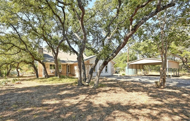 single story home with a carport