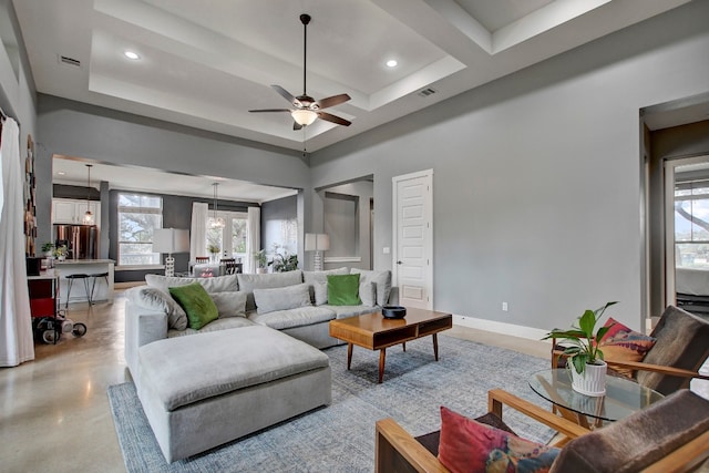 living room featuring ceiling fan