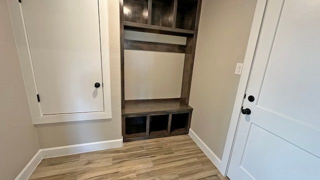 mudroom with light hardwood / wood-style floors