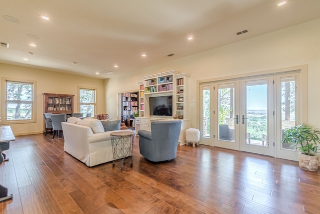 living room featuring hardwood / wood-style floors and french doors