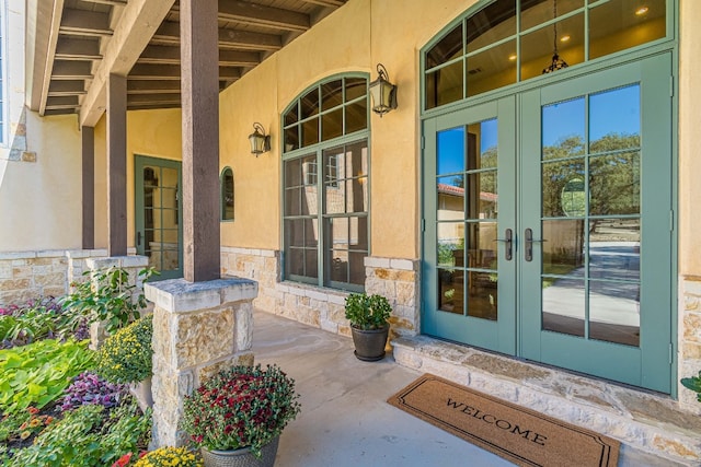 view of exterior entry with french doors