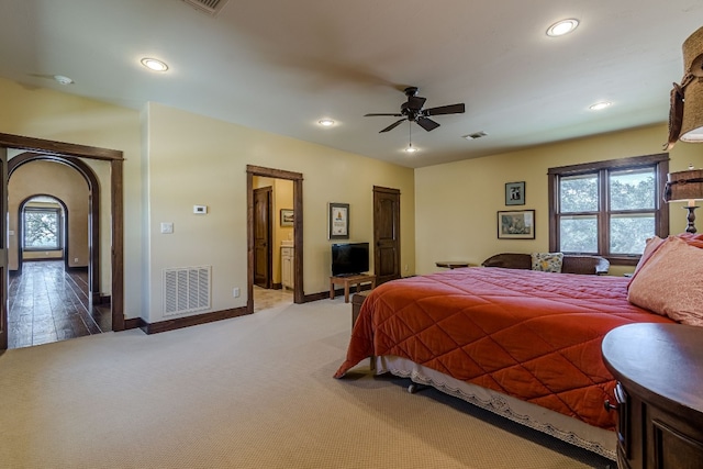 bedroom featuring hardwood / wood-style flooring and ceiling fan