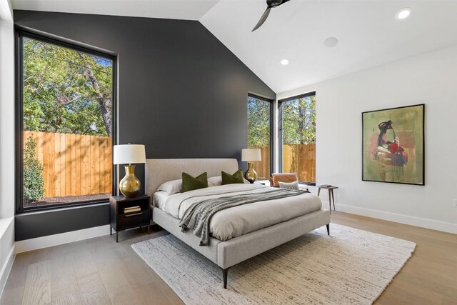 2606 Cavileer Ave, Austin, TX 78757 - bedroom with vaulted ceiling, wood finished floors, recessed lighting, and a ceiling fan