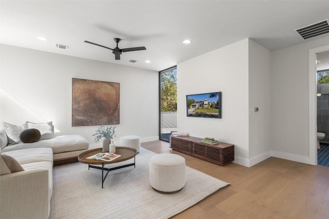 2606 Cavileer Ave, Austin, TX 78757 - living area featuring wood finished floors, recessed lighting, and ceiling fan