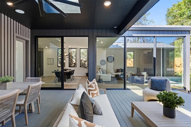 2606 Cavileer Ave, Austin, TX 78757 - wooden terrace featuring outdoor dining space, a ceiling fan, and an outdoor living space