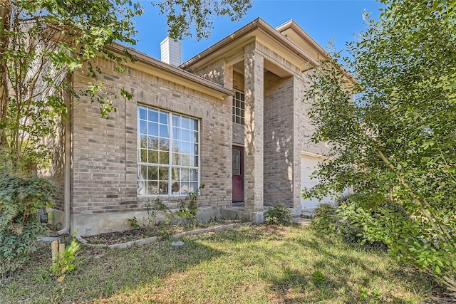 property entrance with a garage