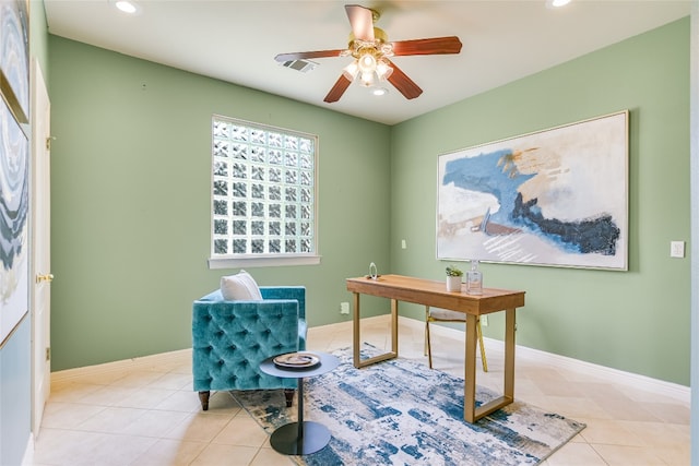 office space featuring ceiling fan and light tile patterned flooring