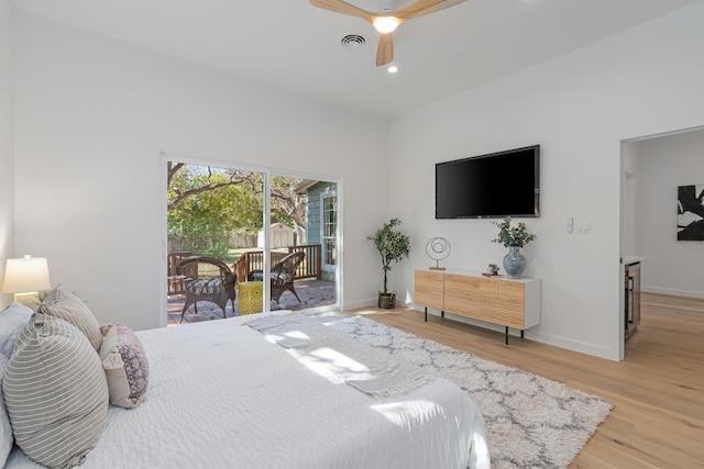 bedroom with ceiling fan, access to outside, and light hardwood / wood-style floors