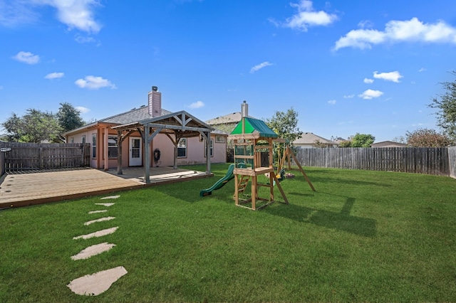 view of jungle gym with a gazebo, a wooden deck, and a lawn