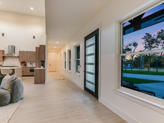 hallway featuring light hardwood / wood-style floors