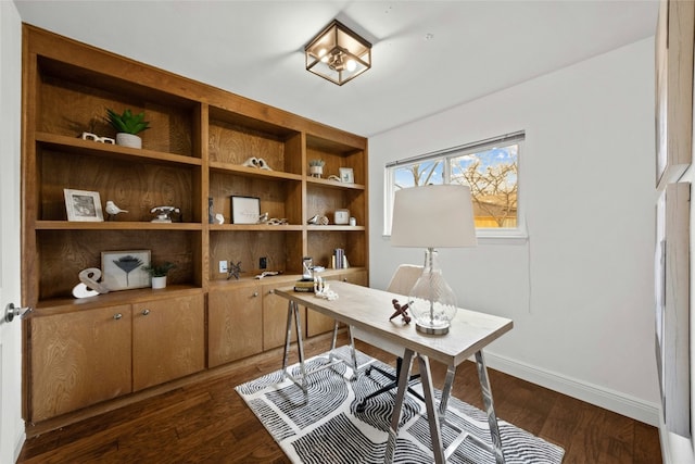 office featuring dark wood-type flooring and baseboards