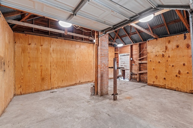 garage with wood walls