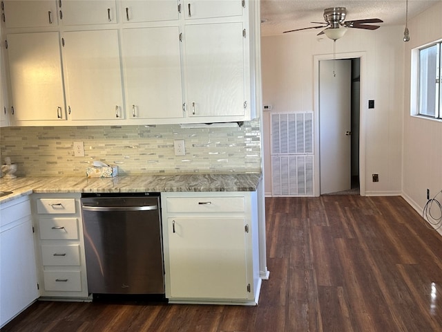 kitchen featuring stainless steel dishwasher, a textured ceiling, ceiling fan, dark wood-type flooring, and white cabinetry