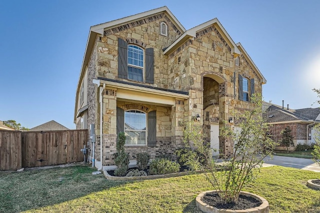 view of front of home with a front lawn