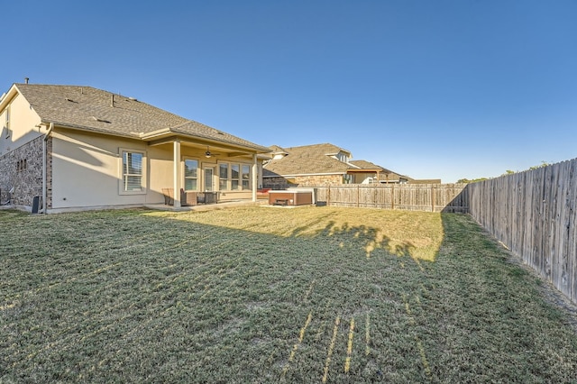 view of yard with ceiling fan