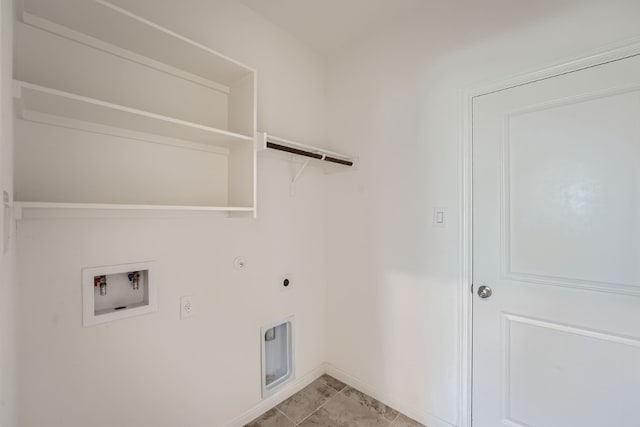 clothes washing area featuring hookup for an electric dryer, washer hookup, hookup for a gas dryer, and light tile patterned flooring