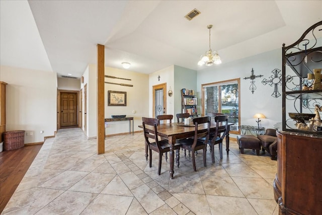 20625 Highland Lake Loop, Lago Vista, TX 78645 - dining area with a chandelier and baseboards