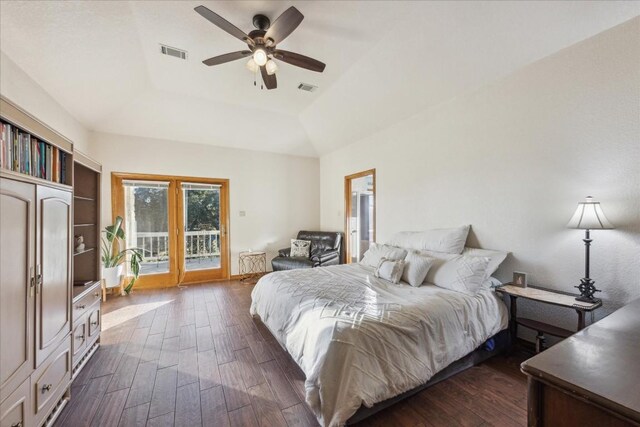 20625 Highland Lake Loop, Lago Vista, TX 78645 - bedroom featuring a raised ceiling, access to exterior, dark wood finished floors, and a ceiling fan