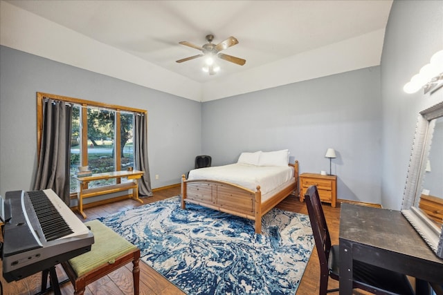 bedroom featuring hardwood / wood-style floors and ceiling fan