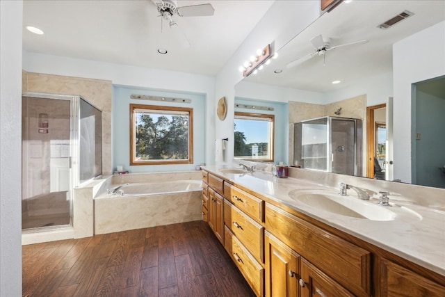 bathroom with ceiling fan, vanity, independent shower and bath, and hardwood / wood-style flooring