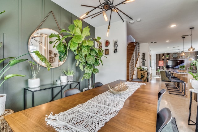 dining area with a notable chandelier