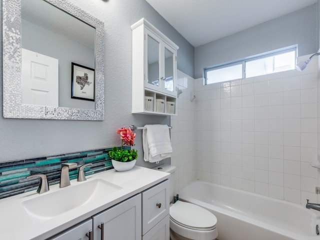 full bathroom featuring shower / bathing tub combination, toilet, and vanity