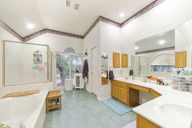 bathroom featuring plus walk in shower, tile patterned flooring, vanity, and lofted ceiling