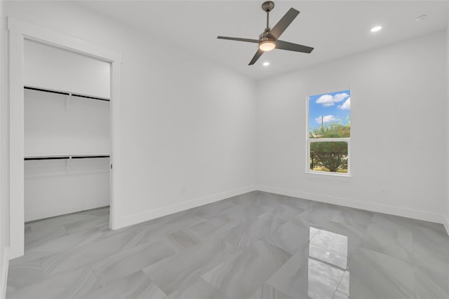 unfurnished bedroom featuring a closet and ceiling fan