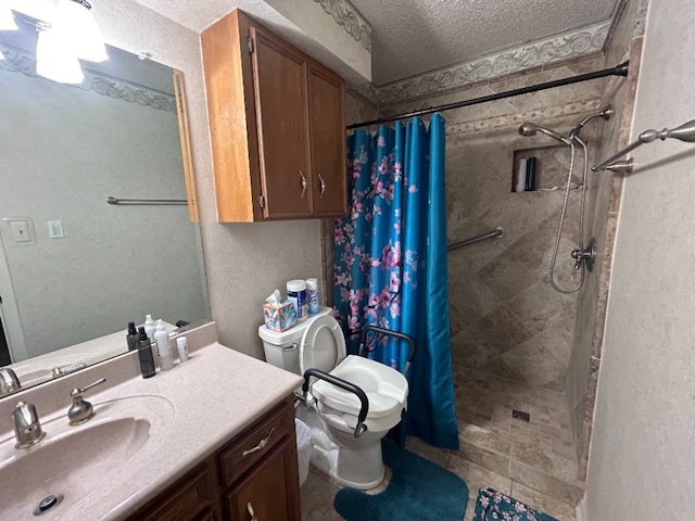 bathroom with toilet, vanity, a textured ceiling, and walk in shower