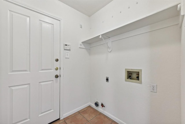 laundry room with electric dryer hookup, light tile patterned flooring, gas dryer hookup, and hookup for a washing machine