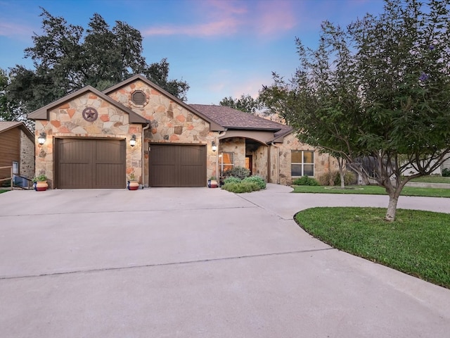 view of front of home with a garage