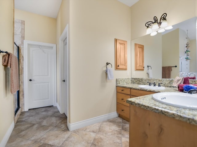 bathroom featuring vanity and a shower