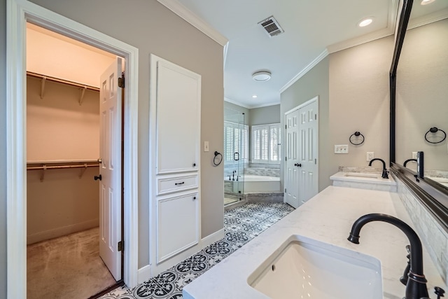 bathroom featuring tile patterned floors, crown molding, vanity, and independent shower and bath