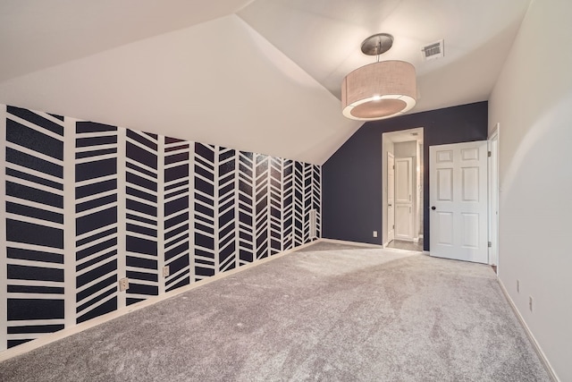 bonus room featuring carpet and lofted ceiling