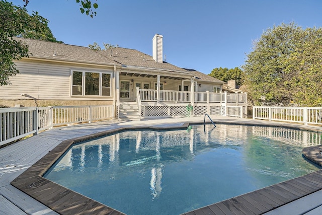 view of pool featuring a deck