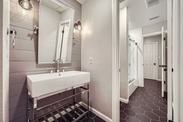 bathroom featuring tile patterned floors and sink