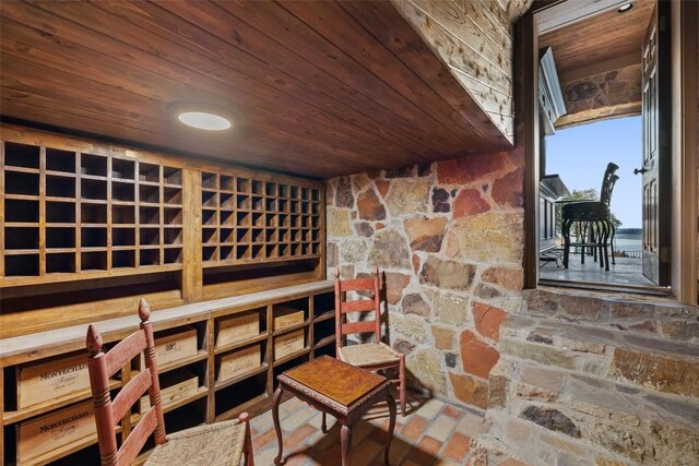 wine room with wooden ceiling