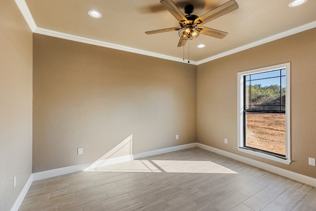 empty room with ceiling fan, ornamental molding, and light hardwood / wood-style flooring