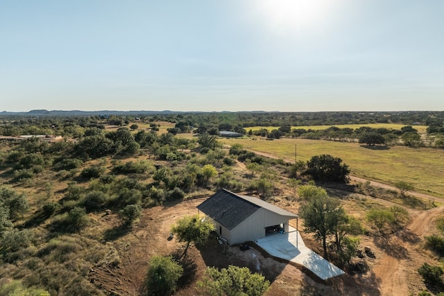 birds eye view of property featuring a rural view