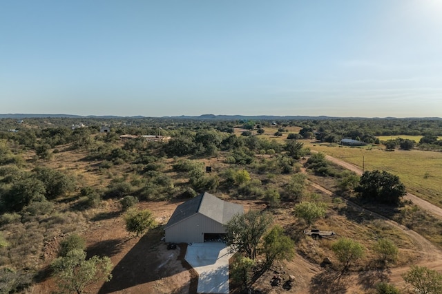 birds eye view of property featuring a rural view