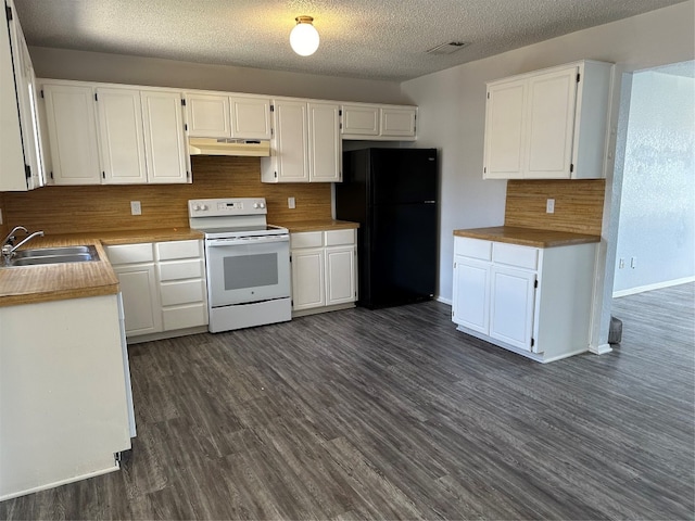 kitchen with black refrigerator, decorative backsplash, dark hardwood / wood-style flooring, white electric range, and white cabinetry