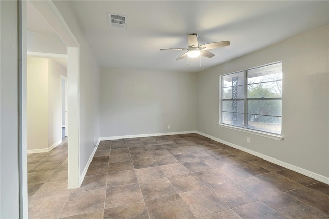 unfurnished room with ceiling fan