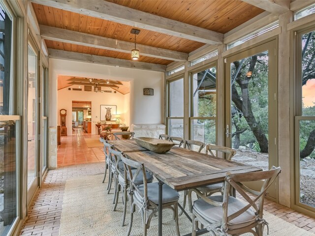 sunroom / solarium with beam ceiling and wood ceiling