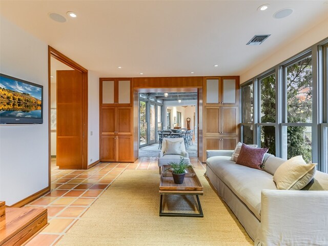 living room with light tile patterned floors