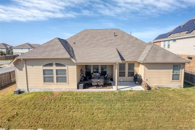 19316 Chayton Cir, Pflugerville, TX 78660 - back of property featuring a shingled roof and a patio area