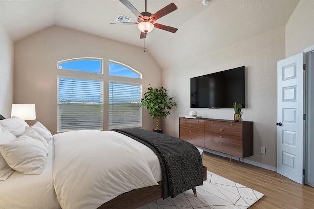 19316 Chayton Cir, Pflugerville, TX 78660 - bedroom featuring vaulted ceiling, light wood finished floors, a ceiling fan, and baseboards