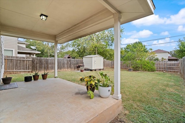 view of patio featuring a shed